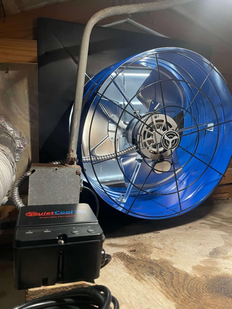 Attic exhaust fan installation in a home in Boynton Beach, improving air circulation and energy efficiency.